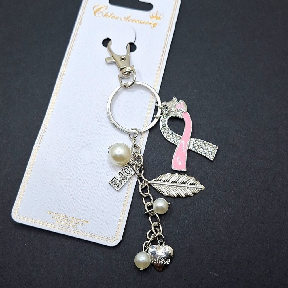 Silver breast cancer awareness feather heart keychain